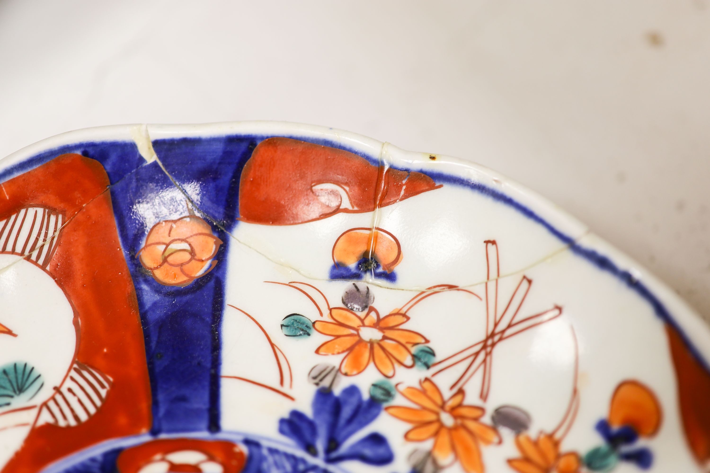Five Japanese Imari dishes, largest 30.5 cm